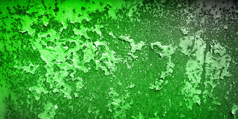 Close-up of a rusted metal surface with peeling paint in vibrant green hues, showcasing a textured pattern of corrosion and decay. This high-resolution image is perfect for backgrounds