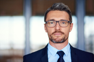 Fototapeta premium Office, serious or business man in portrait for career goals, ideas or justice as immigration lawyer. Professional, male attorney or worker for corporate firm, legal service or labor law in workplace