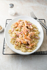 Hot smoked salmon with quinoa and red onion