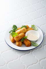 Traditional homemade croquettes with sauce