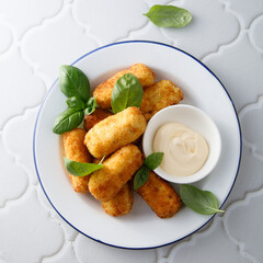 Traditional homemade croquettes with sauce