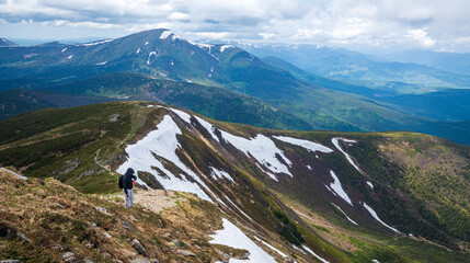 Spectacular view of mountains covered with snow in summer