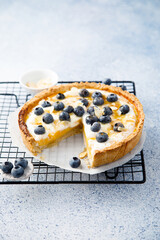 Homemade pumpkin pie with mango, blueberry and honey