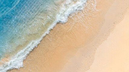 Top view nature of the beach and sea Summer with sunshine sandy beaches, clear blue waters sparkling against the blue sky. on an island with good ecology and environment Background for summer vacation