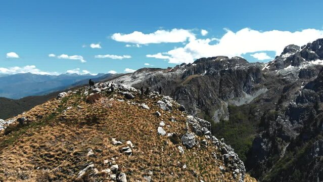 A mountain range is depicted with the word Microsoft featured at the bottom of the image. The scene includes elements like clouds, sky, snow, hills, valleys, and other geological formations