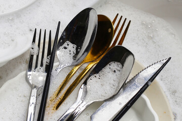 Dirty dishes, cleaning cooking utensils concept