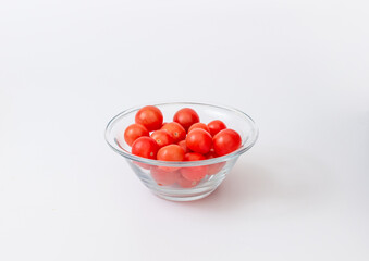 Cherry tomatoes in a glass bowl