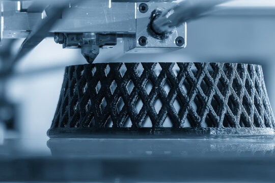 Close up scene the additive manufacturing by 3D printer machine.