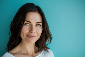 Fototapeta premium A close up portrait of a woman with a subtle smile