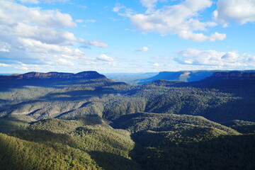 Naklejka premium Landscape of The Three Sisters are an unusual rock formation in the Blue Mountains National Park of Katoomba , New South Wales, Australia, on the north escarpment of the Jamison Valley - Nature Track