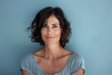 Fototapeta premium A close up portrait of a woman with a subtle smile