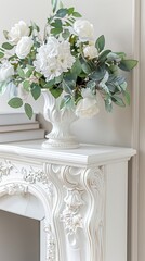 a white fireplace adorned with white flowers and books on top, set against a light background with soft natural daylight.