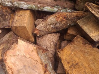 Isolated background of a pile of wood. Suitable for woodworking, carpentry, DIY projects, outdoors, survival, hunting themes.