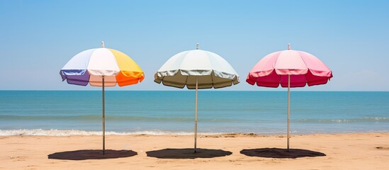 recreation concept beach umbrella lying on sandy beach. Creative banner. Copyspace image