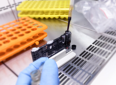 Fully automatic sample prep device works in tandem with cartridge and reagent Kits for extraction and purification of nucleic acids from clinical specimen. PCR Extraction cartridge.