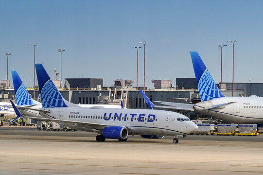 Washington DC, USA - 29 April 2024: Boeing 737 (registration N13716) operated by United Airlines taxiing for take off at Dulles International airport