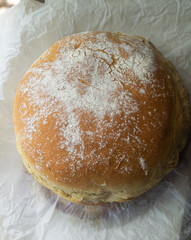 Homemade round bread close-up. Bread is made at home