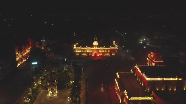 Aerial drone shot of historical buildings lit up during night time in Gwalior city of Madhya Pradesh India