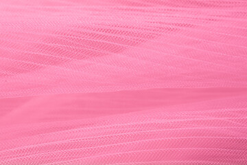closeup of pink corrugated organza textured background