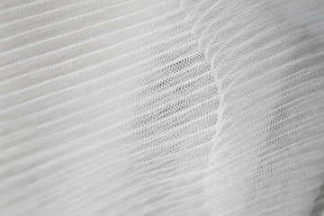 closeup of white corrugated organza textured background