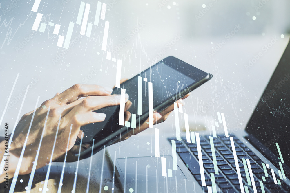 Poster multi exposure of abstract financial graph and hand working with a digital tablet on background, fin