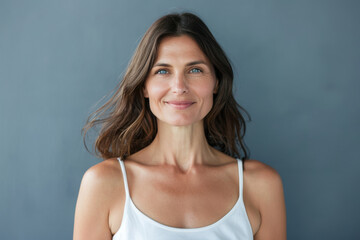 Fototapeta premium A close up portrait of a woman with a subtle smile