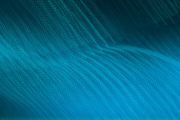closeup of blue corrugated organza textured background