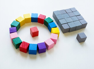 Hierarchy of the company of the leader and manager. Structures of colored cubes and gray ones.