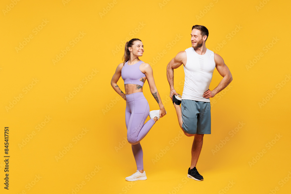 Wall mural full body young happy strong fitness trainer sporty two man woman wear blue clothes spend time in ho