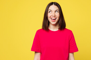 Young surprised shocked amazed cheerful excited fun woman she wear pink t-shirt casual clothes look...