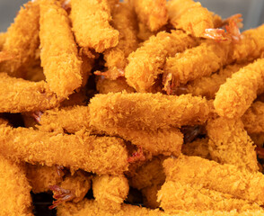 fried shrimp in batter as a background.