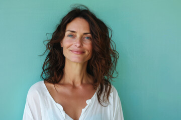 Fototapeta premium A close up portrait of a woman with a subtle smile