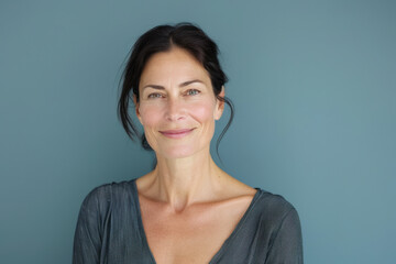 Fototapeta premium A close up portrait of a woman with a subtle smile