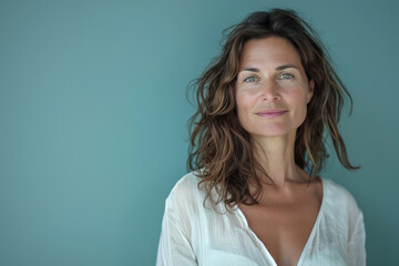 Fototapeta premium A close up portrait of a woman with a subtle smile
