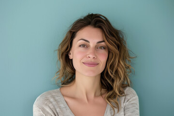 A close up portrait of a woman with a subtle smile