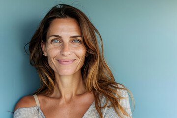 Fototapeta premium A close up portrait of a woman with a subtle smile