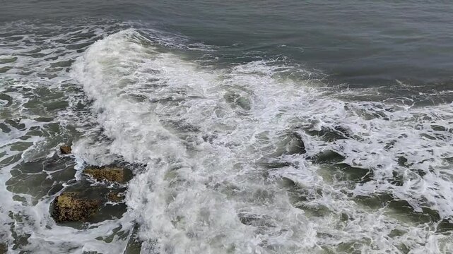 Extreme waves crash on shore, Rocky ocean coast in Iceland, Awesome power of waves, Full HD view