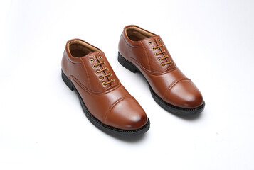 tan leather formal uniform shoes isolated on white background