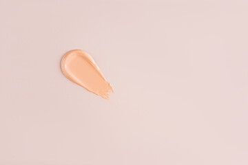 A sample, a stroke of foundation powder in a natural tone. cosmetic swatch. Mockup for the design of the cosmetic texture of the product.