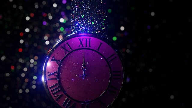 Abstract glowing clock with hands of the clock showing midnight. New Year background. 4K video animation 3d rendering.