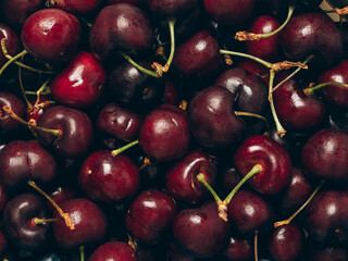 Fresh ripe sweet cherry background. Closeup, top view.