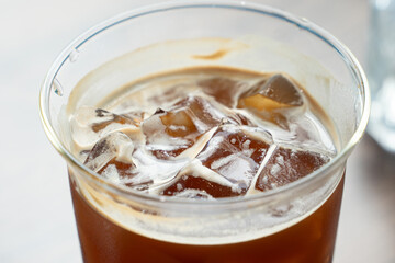 glass of coffee and a cake