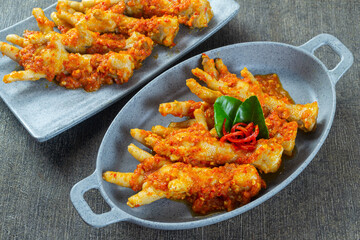 ceker mercon, indonesia food made from chicken feet cooked with spicy seasonings. top view food