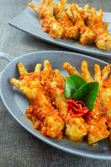 ceker mercon, indonesia food made from chicken feet cooked with spicy seasonings. top view food