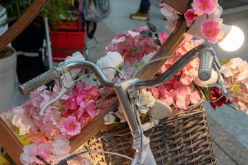 Artificial Pink Flowers in Basket close up