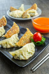 Kuotie, one of the Chinese snacks, is a type of dimsum with various meat and vegetable fillings Usually a meal at family gatherings during Chinese New Year celebrations