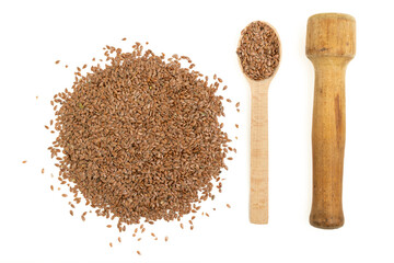 A pile of dry flax grains and wooden spoons on a white background