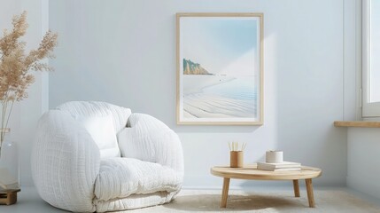 A bright and airy living room with a white boucle armchair, a light wood coffee table, and a mock-up poster frame containing a seaside landscape. 