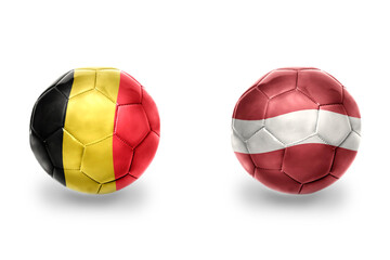 football balls with national flags of latvia and belgium ,soccer teams. on the white background.
