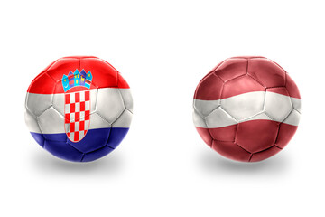 Obraz premium football balls with national flags of latvia and croatia ,soccer teams. on the white background.